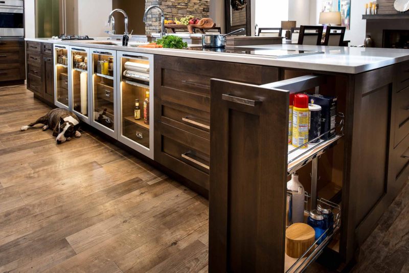 Heart of the Treehouse 12 modern kitchen with pullout pantry storage in the island